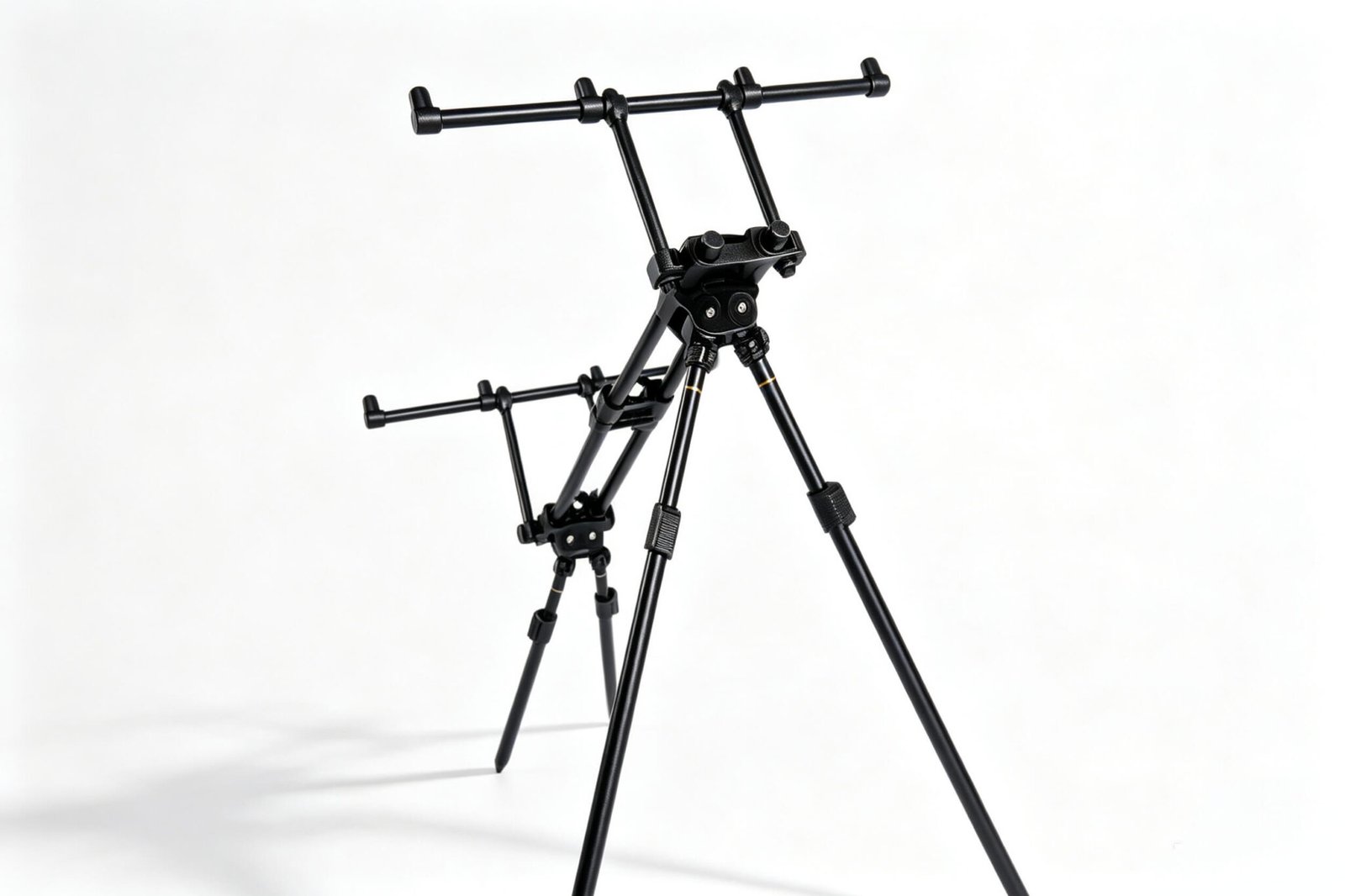 A high-angle view of an all-terrain carp fishing rod pod, showcasing its adjustable frame and stable base.